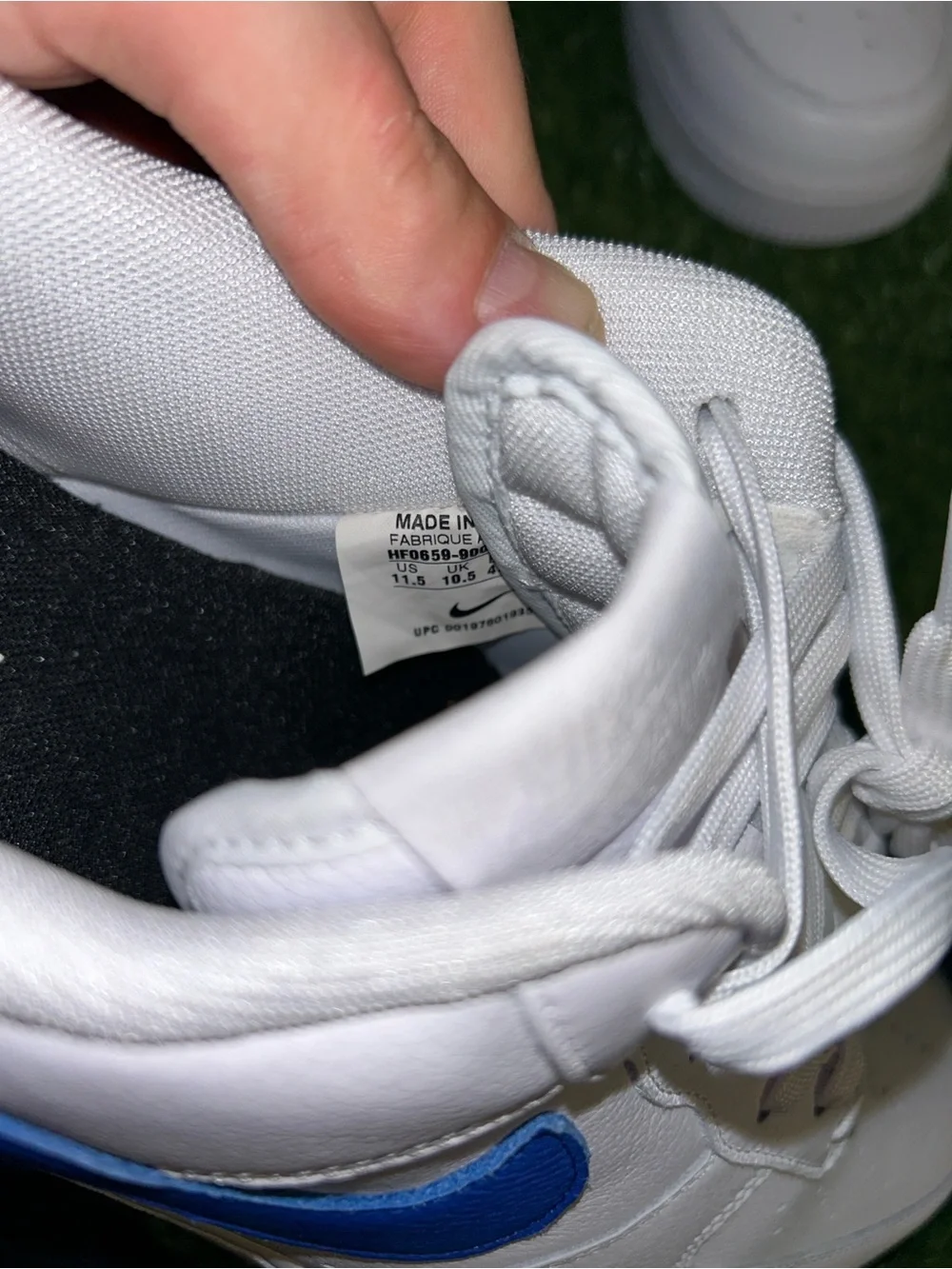 Nike White Leather Sneakers with Blue Swoosh